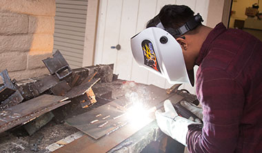 student welding image